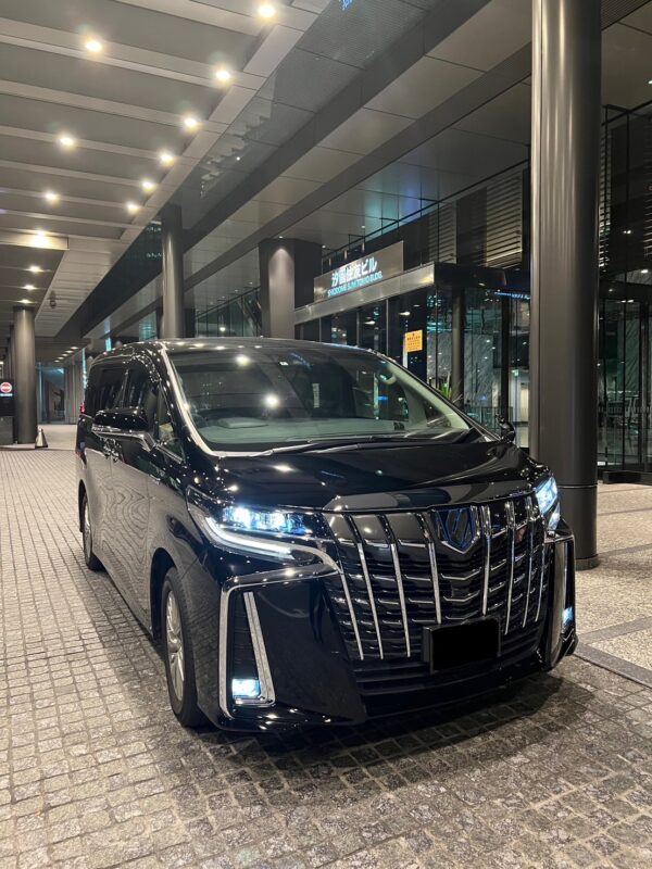 A Toyota Alphard waiting to pick customers up