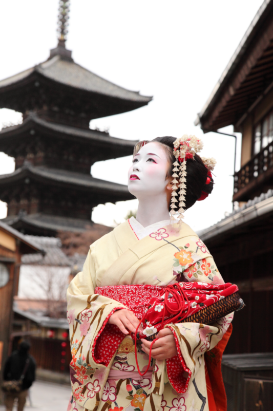 maiko geisha in front of temple